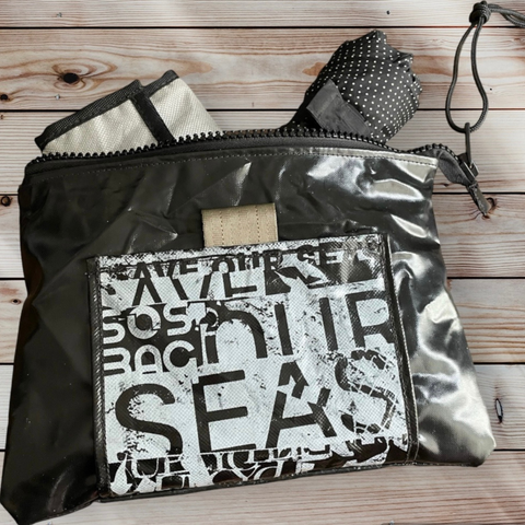 MOON CLUTCH BAG. SAVEOURSEAS COLLECTION 